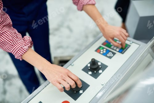Preview: Woman Operating Machine at Factory