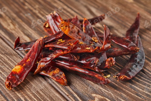 Preview: Dried red hot pepper on wooden vintage background