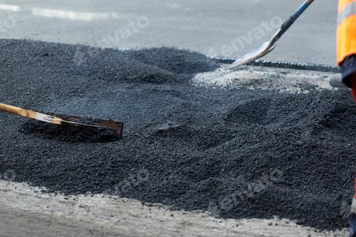 Preview: The road workers' working group updates part of the road with fresh hot asphalt