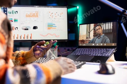 Preview: African american male freelancer attends virtual meeting call with clients