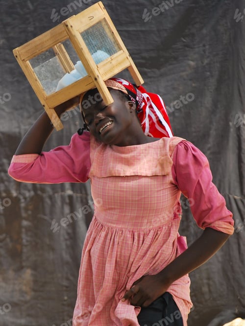 Preview: Poor girl dressed in pink selling salt at the market and crying - emotion poverty africa