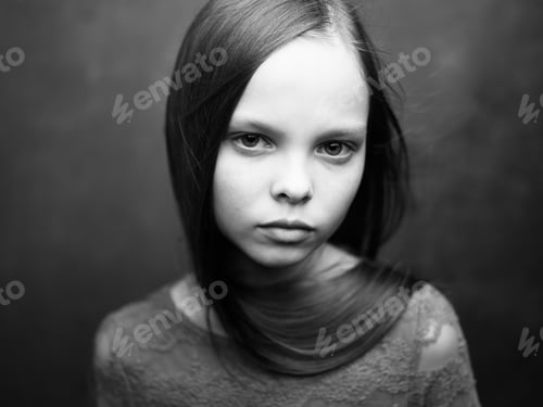 Preview: Gray photo of a girl in a cropped view of a dress