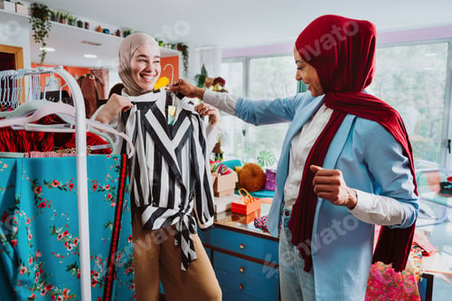 Preview: Muslim women shopping for clothes in retail store