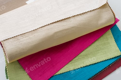 Preview: Samples of colorful interior fabrics. Book of fabrics for curtains, upholstery