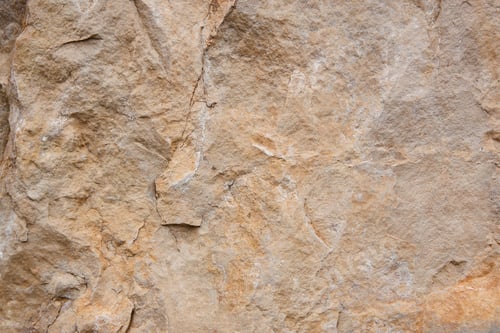 Preview: Natural stone background detail in warm tone. Texture