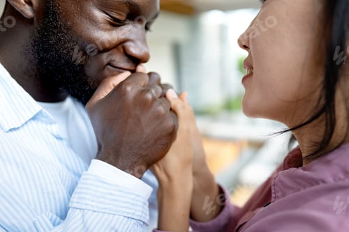 Preview: Interracial couple embracing celebrating love, diversity, and unity in a supportive relationship