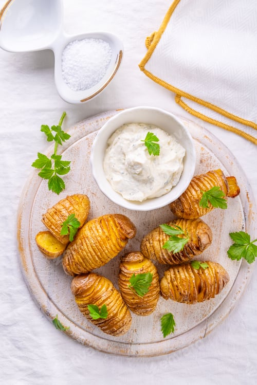Preview: Traditional Swedish dish Hasselback potatoes with cream cheese dip