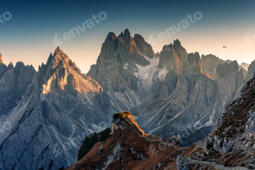 Preview: Alpine landscape of Cadini di Misurina with rugged mountain range during sunset in Dolomites, Italy