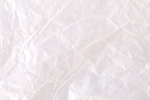 Preview: White crumpled paper texture forming an elegant background