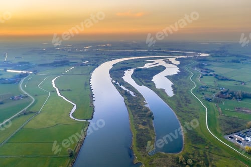 Preview: Lowland river IJssel through sunset landscape