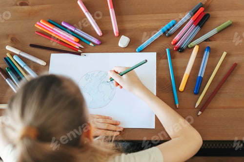 Preview: Child girl drawing with colorful pencils
