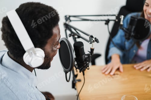 Preview: Hosts having podcast session together - Female speaker making an interview during live stream