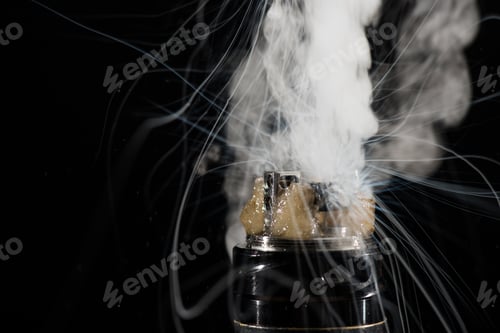 Preview: Activating electronic cigarette with clouds of smoke on dark background