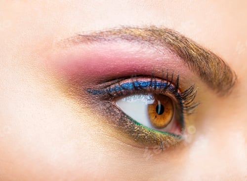 Preview: Close up portrait of a beautiful young model with bright make up