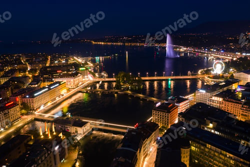 Preview: Aerial night view of Geneva city water fountain in Switzerland