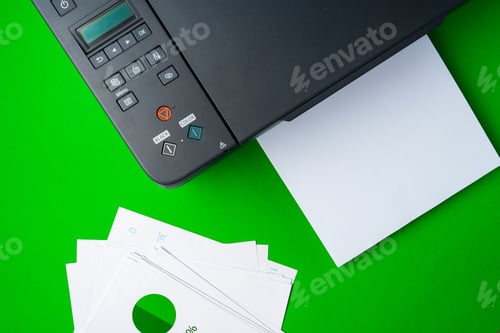 Preview: Modern printer with paper on green background