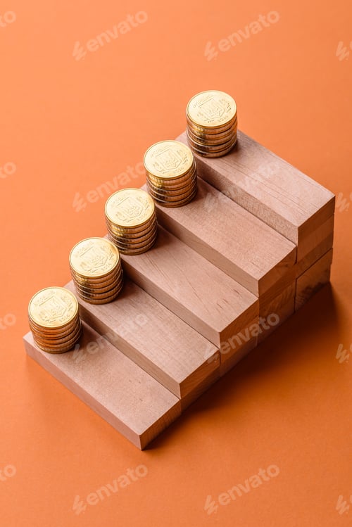 Preview: Conceptual composition of wooden steps with coins, model of a house