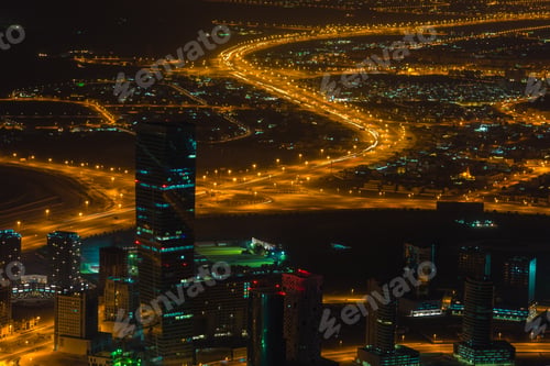 Preview: Dubai downtown night scene with city lights. Top view