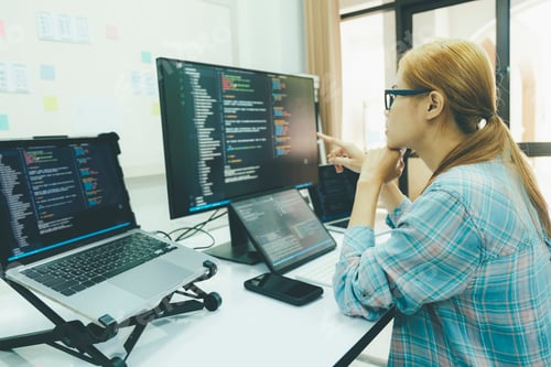 Preview: Programmer is coding and programming software.