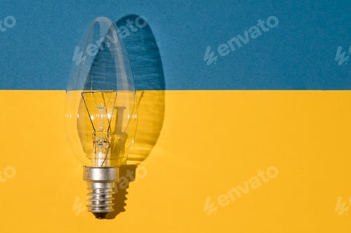 Preview: Lightbulb Over Blue and Yellow Background