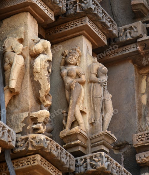 Preview: Stone carving bas relief sculptures on Khajuraho Temple, India.