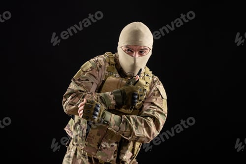 Preview: front view of young soldier in uniform on black background warriors tank israel