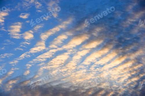 Preview: Clouds, blue sky and sunset. A photo of beautiful clouds at sunset.