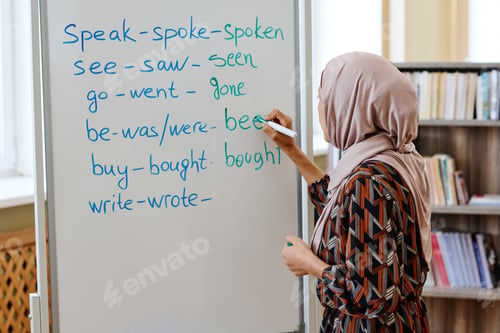 Preview: Woman Learning Irregular Verbs