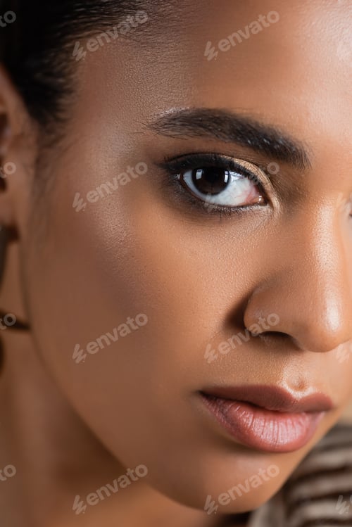 Preview: close up of young african american woman looking at camera