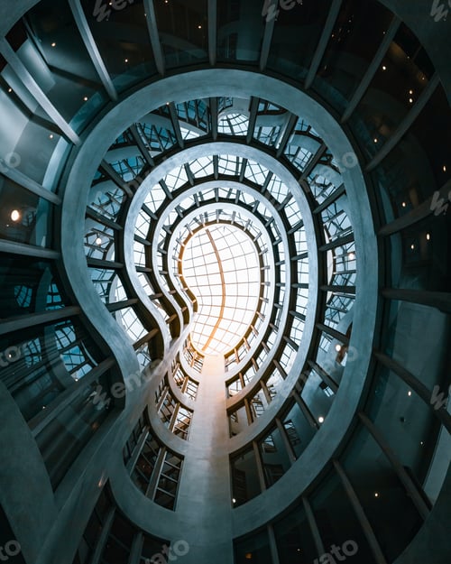 Preview: Low angle inside a modern building with geometrical walls and dome