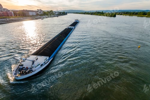 Preview: Cargo ship with coal bulk load on the river Rhine in Mainz, Germany