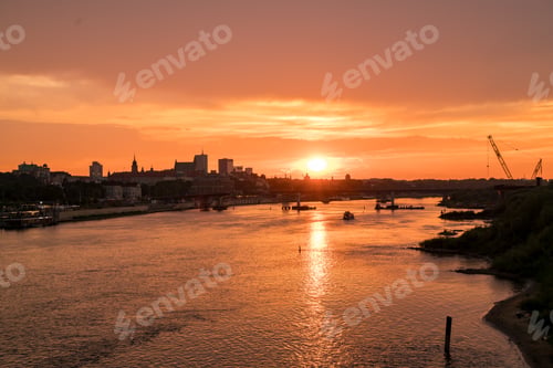 Preview: Evolving Spring Dusk: Warsaw Old City Embankment and Bridge View