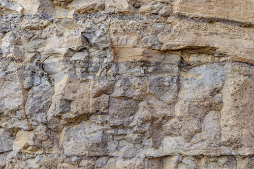 Preview: Close-up detailed shot of a natural stone texture with rugged details in Iceland