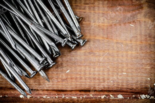 Preview: A pile of nails on the table.