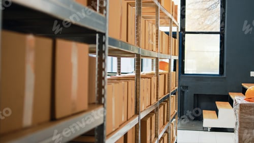 Preview: Many cardboard boxes placed on racks in storehouse