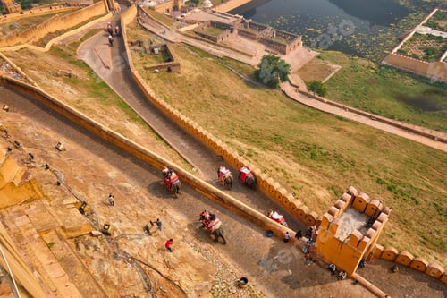 Preview: Tourists riding elephants on ascend to Amer fort