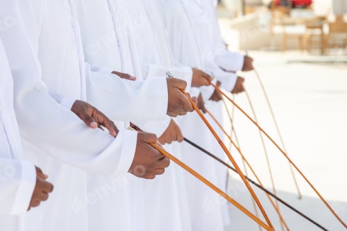 Preview: Traditional Emirati Al Ayalah male dance, UAE heritage, hands in frame