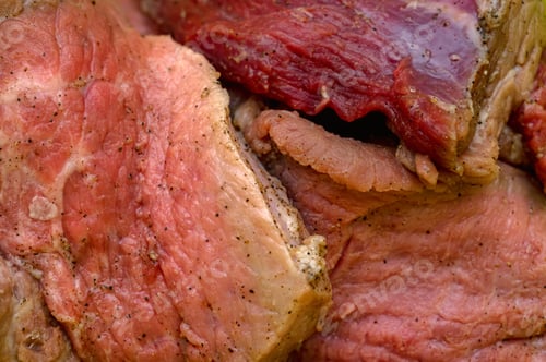 Preview: Close-up of chopped raw pork pieces with seasoning