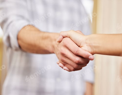 Preview: Cropped shot of two unrecognizable businesspeople shaking hands while standing in an office