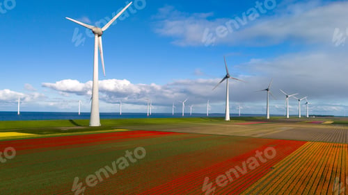 Preview: A serene landscape in the Netherlands, showcasing a wind farm with numerous windmills standing tall