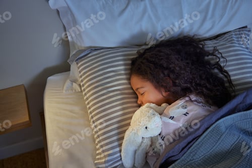 Preview: Lovely little girl sleeping peacefully during night