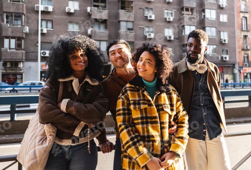 Preview: Group of young tourists visiting a european city center