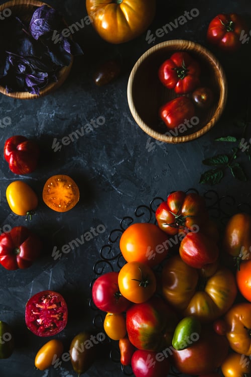 Preview: Composition with delicious tomatoes, wooden board and products on grey background, healthy food