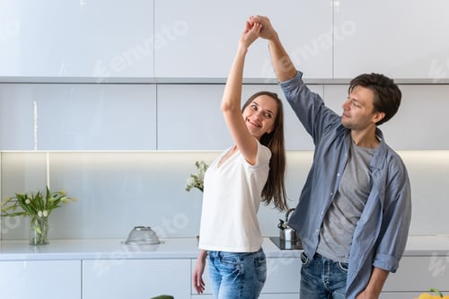 Preview: Cute couple dancing in the kitchen