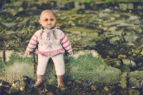 Preview: Old dirty doll. Children's toy doll in dirty clothes