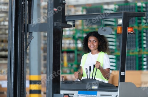Preview: Worker in auto parts warehouse use a forklift to work to bring the box of auto parts