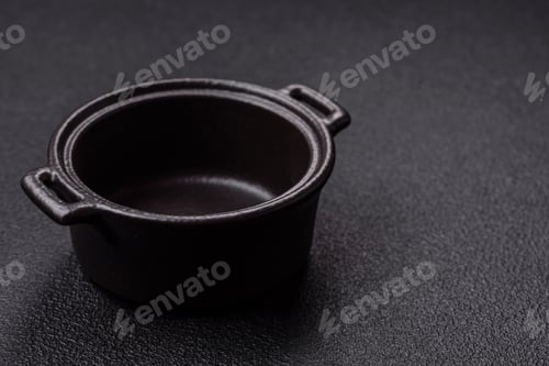 Preview: Beautiful empty white ceramic gravy boat on a concrete background