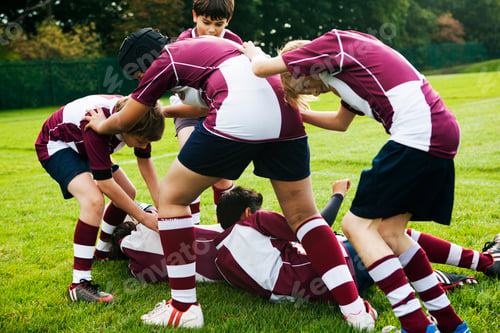 Preview: Teenage schoolboy rugby team playing aggressively