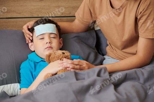 Preview: Sick Preteen Boy Hugging Teddy Bear