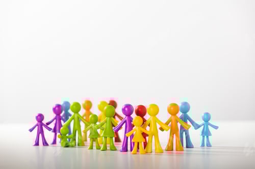 Preview: Colorful Figurines Stand Together On White Background